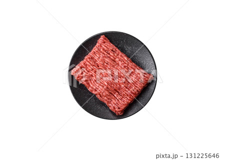 Raw ground beef meat food, ingredient for making cutlets or meatballs. Raw ground beef Raw ground beef meat food, ingredient for making cutlets or meatballs. Raw ground beef 131225646