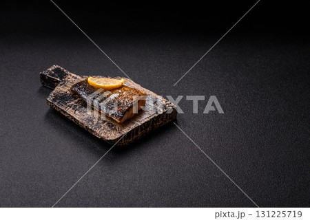 Food, seafood, grilled fish fillet with lemon, salt and spices. Grilled fish fillet 131225719