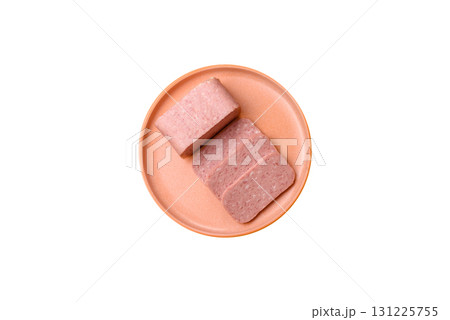 Food, meat, ham sliced in slices for the festive table. Spiced ham 131225755