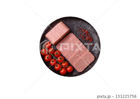 Food, meat, ham sliced in slices for the festive table. Spiced ham 131225756