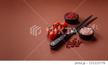 Empty meat or steak fork with vegetables, spices and other ingredients. Meat fork 131225776