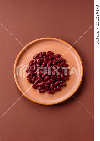 Red beans canned as an ingredient for cooking healthy or vegetarian food. Canned beans Red beans canned as an ingredient for cooking healthy or vegetarian food. Canned beans 131226143