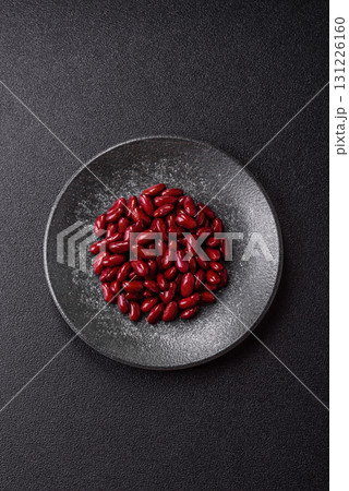 Red beans canned as an ingredient for cooking healthy or vegetarian food. Canned beans Red beans canned as an ingredient for cooking healthy or vegetarian food. Canned beans 131226160
