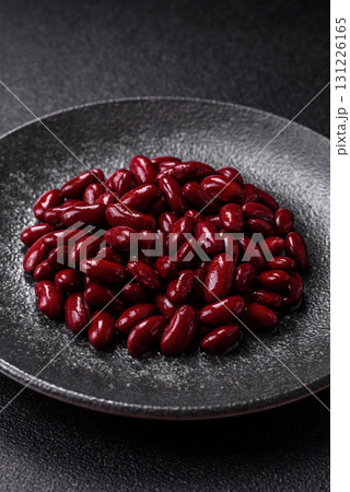 Red beans canned as an ingredient for cooking healthy or vegetarian food. Canned beans Red beans canned as an ingredient for cooking healthy or vegetarian food. Canned beans 131226165