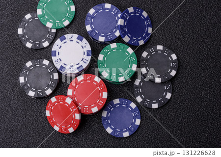 Casino chips, bets and gambling, risk to win or lose money. Betting chips Casino chips, bets and gambling, risk to win or lose money. Betting chips 131226628