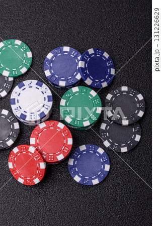 Casino chips, bets and gambling, risk to win or lose money. Betting chips Casino chips, bets and gambling, risk to win or lose money. Betting chips 131226629