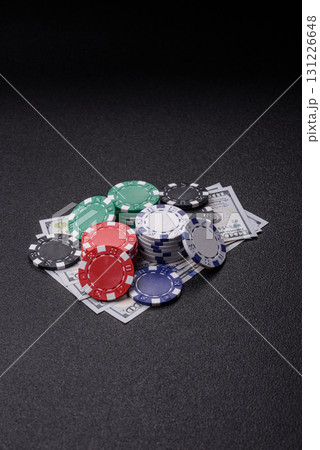 Casino chips, bets and gambling, risk to win or lose money. Betting chips Casino chips, bets and gambling, risk to win or lose money. Betting chips 131226648