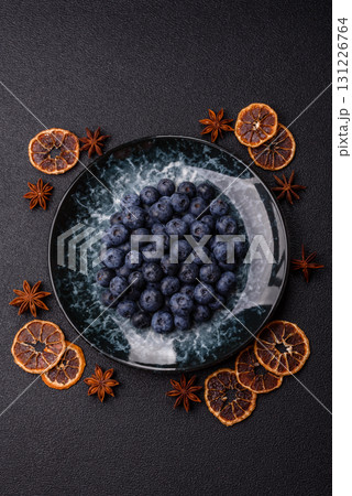 Fresh juicy blueberries, healthy vegan food with vitamins and minerals. Blueberries berry 131226764