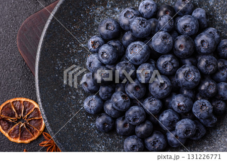 Fresh juicy blueberries, healthy vegan food with vitamins and minerals. Blueberries berry Fresh juicy blueberries, healthy vegan food with vitamins and minerals. Blueberries berry 131226771