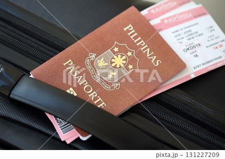 Philippines passport and avia tickets on travel bag. The concept of travel and vacation 131227209