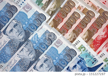 Pakistan rupees banknotes close up. The current Pakistan money bills lies on table in big amount Pakistan rupees banknotes close up. The current Pakistan money bills lies on table in big amount 131227287