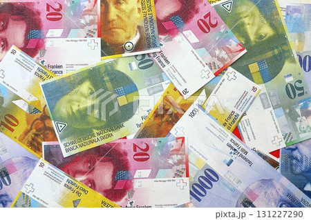 Swiss franc banknotes. The current francs money bills lies on table in big amount 131227290