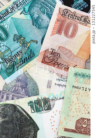 Egyptian pound currency money bills. The current banknotes lies on table in big amount 131227345