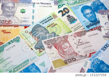 Nigerian naira currency money bills. The current banknotes lies on table in big amount Nigerian naira currency money bills. The current banknotes lies on table in big amount 131227358