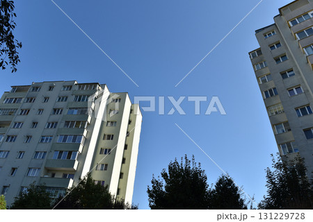 Typical facade of concrete panel building. Post Soviet flat of blocks 131229728
