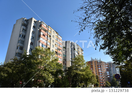 Suburban neighborhood built in communism. Post Soviet concrete flat of blocks Suburban neighborhood built in communism. Post Soviet concrete flat of blocks 131229738
