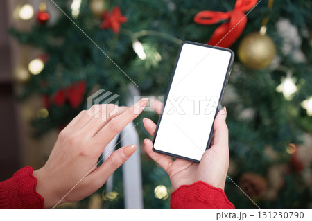 Online shopping for Christmas gifts using smartphone 131230790