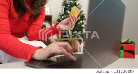 Online Christmas Shopping with Credit Card in Hand Online Christmas Shopping with Credit Card in Hand 131230807