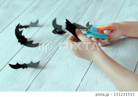 a child's hands cut out paper bats, Halloween a child's hands cut out paper bats, Halloween 131231533