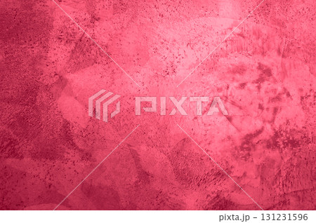 background, texture of concrete and stone in the color of 2023 viva magenta 131231596