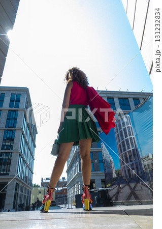 Woman on the background of the business building Woman on the background of the business building 131232834