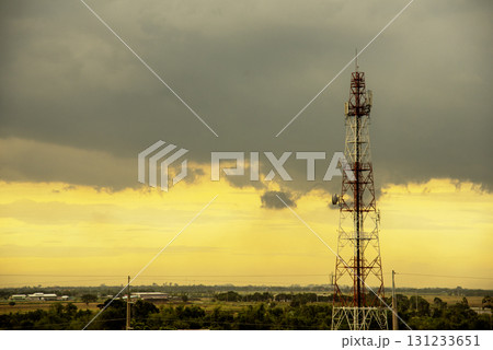 Gold sky High voltage pole electric wiring distribution landscape energy engineering. Electricity energetic background golden sunset sky countryside. Electric power energy engineering industrial Gold sky High voltage pole electric wiring distribution landscape energy engineering. Electricity energetic background golden sunset sky countryside. Electric power energy engineering industrial 131233651