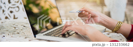 Banner Woman typing laptop computer online meeting at home office work from home. Asian businesswoman use notebook laptop. Programmer woman typing keyboard laptop read online website with copy space Banner Woman typing laptop computer online meeting at home office work from home. Asian businesswoman use notebook laptop. Programmer woman typing keyboard laptop read online website with copy space 131233662