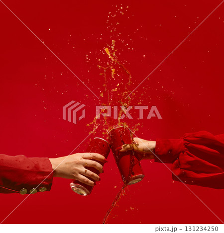 Dynamic red beer cans splash in motion against monochrome red background. Mockup for text, ad Dynamic red beer cans splash in motion against monochrome red background. Mockup for text, ad 131234250