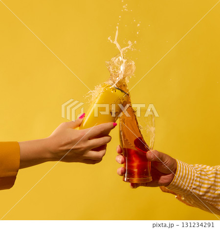 Exploding mockup beer can and glass splash with motion energy on yellow Exploding mockup beer can and glass splash with motion energy on yellow 131234291