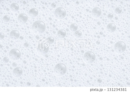 Soft sudsy bubbles morphing across flat surface creating subtle foam pattern ideal for cleaning product labels, detergent marketing and interior design boards 131234381