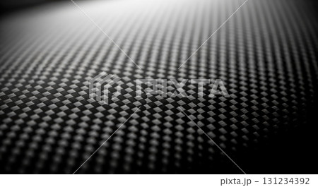 Futuristic composite material surface with woven grid detail perfect for sport car industry or high tech product presentation backdrop 131234392