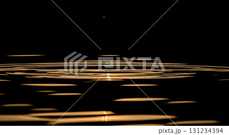 Abstract water ripple background with golden light reflection on dark liquid surface for luxury spa or tranquil meditation concepts 131234394