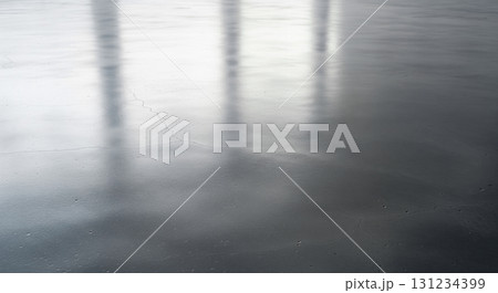 Polished concrete floor texture with light reflection for modern industrial background or empty room product display with minimalist design 131234399