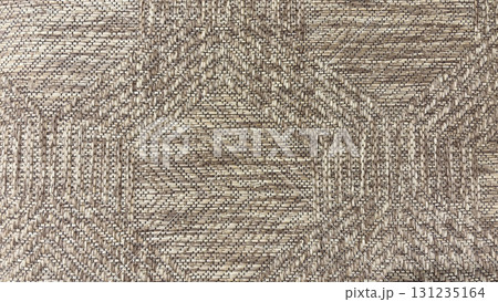 Natural woven fabric texture with geometric pattern in beige and brown tones, rustic handmade textile background 131235164