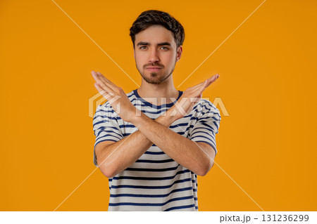 Dissatisfied handsome man Disapproving With No Sign, Refuse Offer. Rejecting 131236299