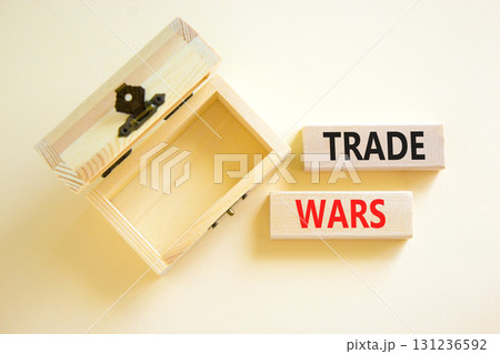 Trade wars symbol. Concept word Trade wars on beautiful wooden blocks. Beautiful white paper background. Empty wooden beautiful chest. Business trade wars concept. Copy space. 131236592