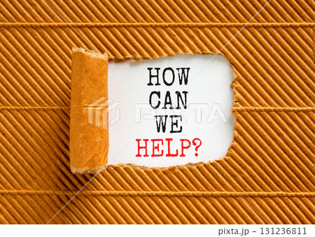 How can we help symbol. Concept words How can we help on beautiful white paper. Beautiful brown background. Business and how can we help concept. Copy space. 131236811