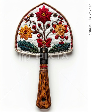Artisan Needlepoint Trowel Featuring Poinsettia and Floral Motifs with a Decorative Wooden Handle on a White 131237652