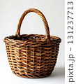 Wicker Basket With Handle on a Neutral Background Studio Shot Simple Rustic Woven Design Storage Container 131237713