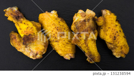 fried chicken wings on white plate fried chicken wings on white plate 131238594