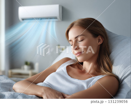 Relaxed woman sleeping peacefully with fresh cool air from sustainable energy air conditioner. modern system provides comfort and climate control for serene home 131239056