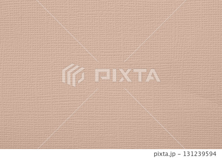 Soft pink textured surface with delicate geometric pattern and elegant pastel tone, calm and feminine aesthetics.. Natural background gentle woven pattern for design, copy space 131239594