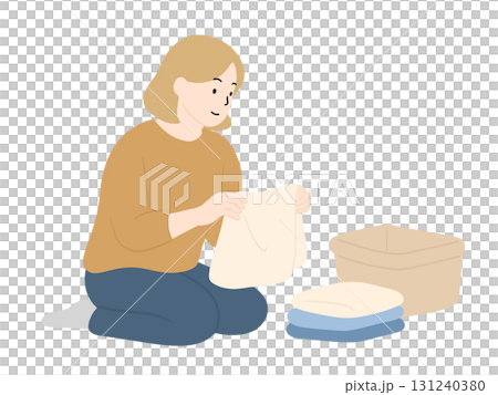 Woman folding laundry, housework 131240380