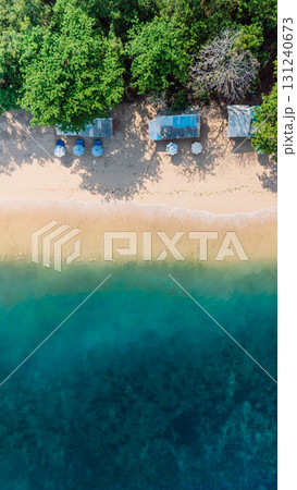 Tropical sandy beach with ocean in Bali, Thomas beach. Aerial view 131240673