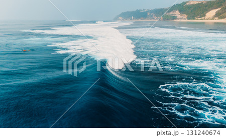Crashing surfing wave on Pandawa beach in Bali 131240674