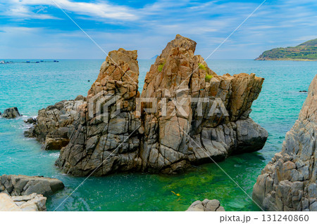 Rocks in the sea bay. 131240860
