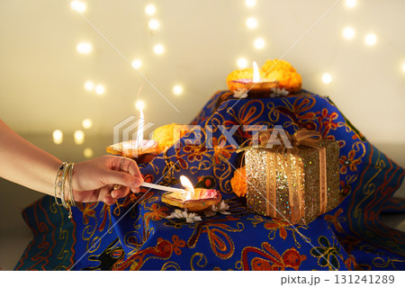 Lighting Diwali Candles with Decorative Gift Lighting Diwali Candles with Decorative Gift 131241289