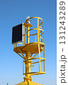 Yellow maritime signal powered by solar panel with clear blue sky 131243289
