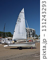 Sailboat standing on the beach on a sunny day with blue sky 131243293