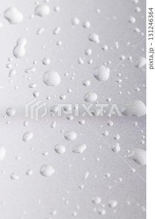 silver colored metal surface covered with drops of pure water, wet silver-colored metal painted to protect aluminum alloy and metals, close up silver colored metal surface covered with drops of pure water, wet silver-colored metal painted to protect aluminum alloy and metals, close up 131246364